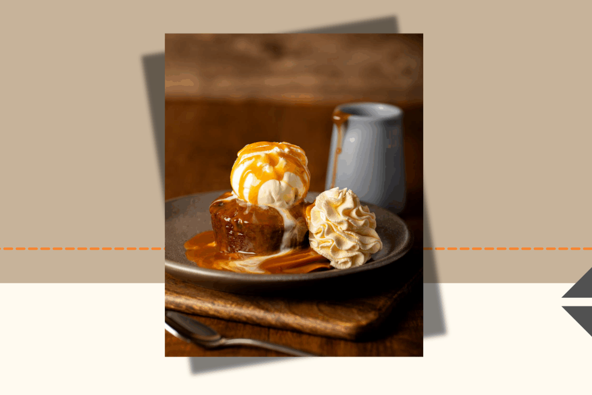 Warm sticky date pudding topped with caramel sauce, vanilla ice cream and cream at The Coffee Club, Ormiston Town Centre.